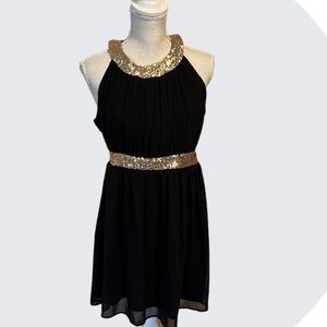 Red Clover black party dress with gold trim. Sz Med